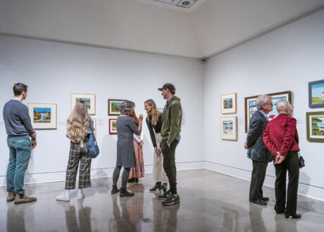 Several people looking at art in the Art Gallery of Nova Scotia