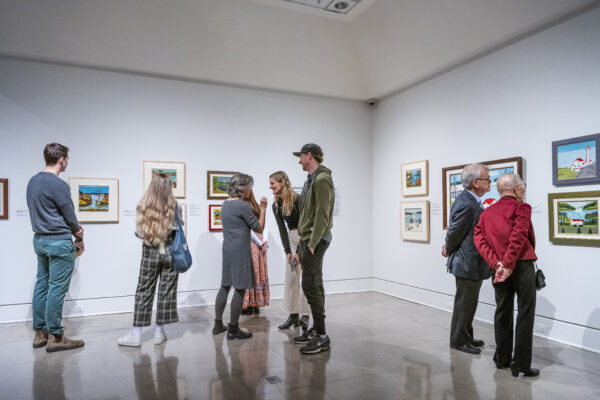 Several people looking at art in the Art Gallery of Nova Scotia